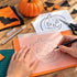 Halloween crafting essentials kit by BZBox with 7 seasonal craft supplies and decorations for Halloween projects.